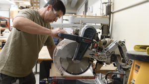 Man working on machine.